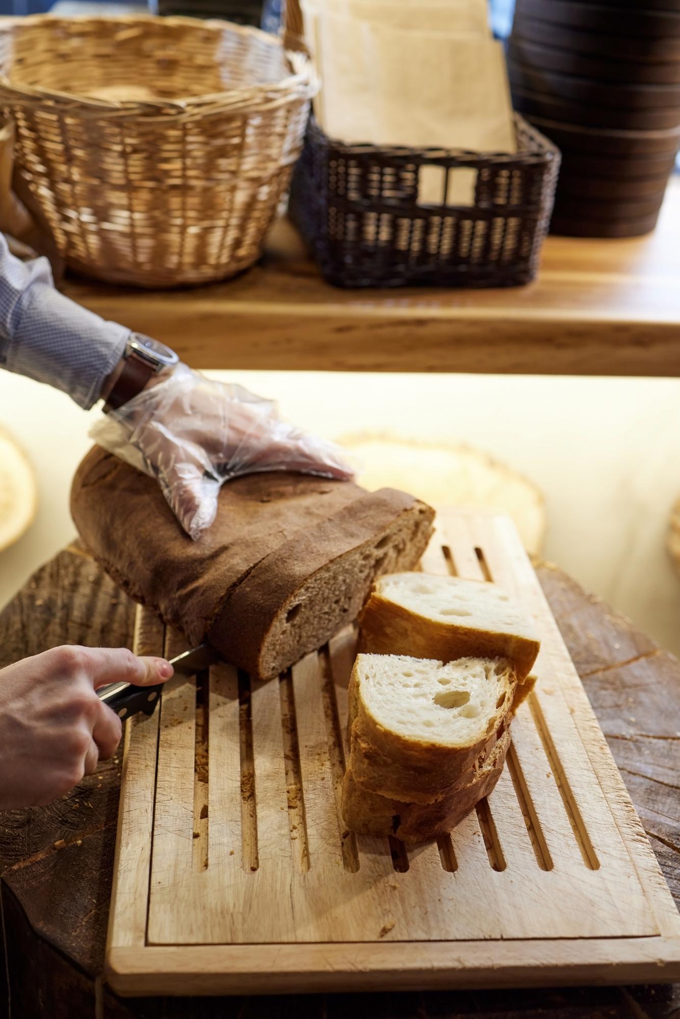 Wooden board with artisanal bread and butter